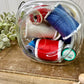 Vintage Glass Clasp Jar with Thread Spools