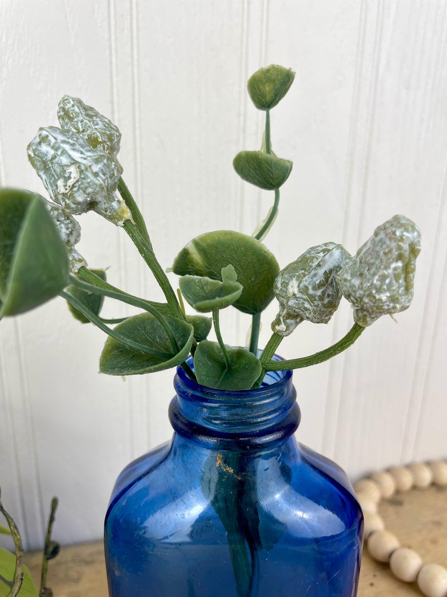 Vintage Cobalt Blue Glass Medicine Bottle with Greenery