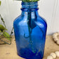 Vintage Cobalt Blue Glass Medicine Bottle with Greenery