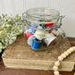 Vintage Glass Clasp Jar with Thread Spools