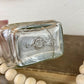 Vintage Clear Glass Bottle with Greenery