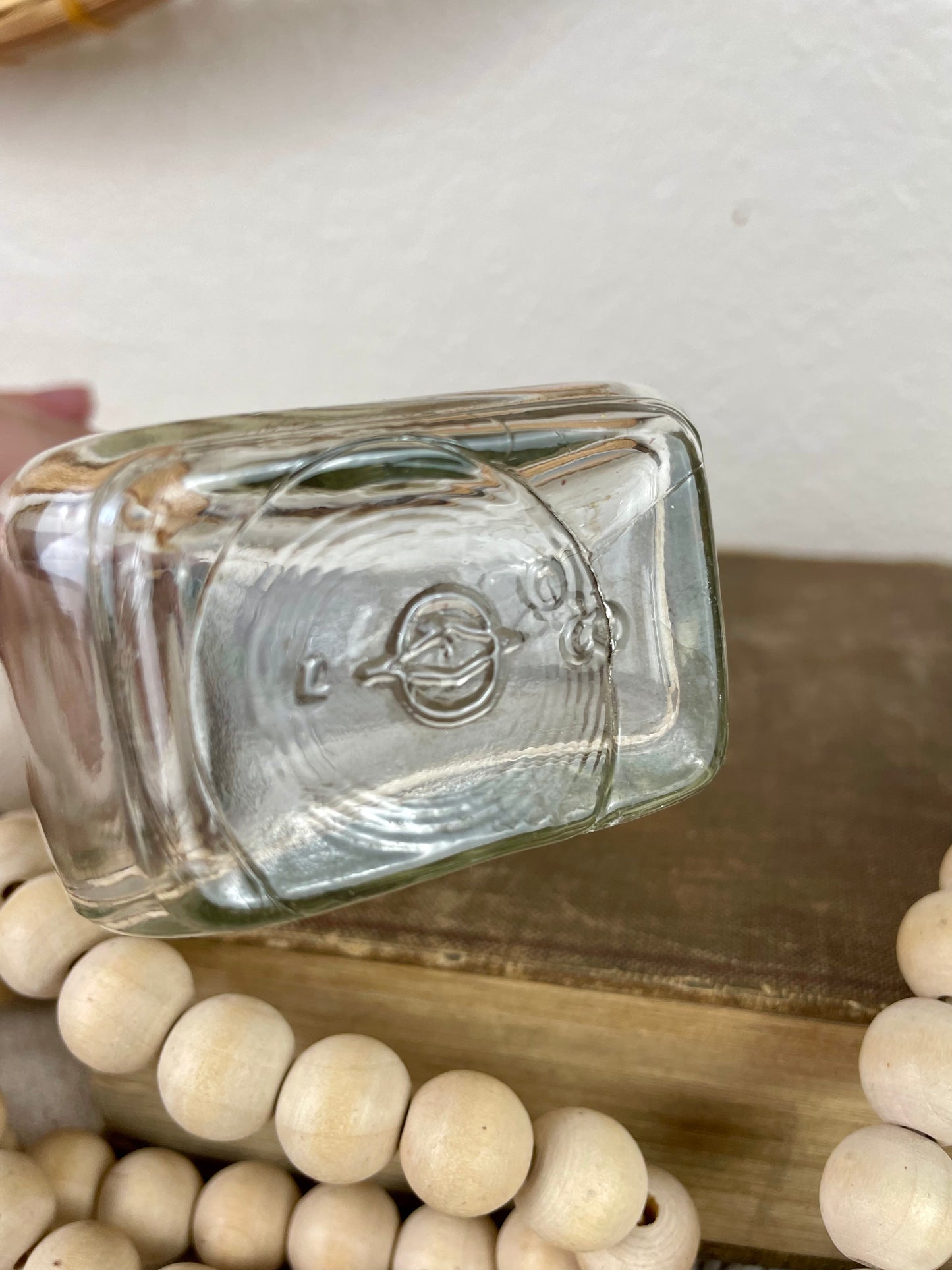 Vintage Clear Glass Bottle with Greenery