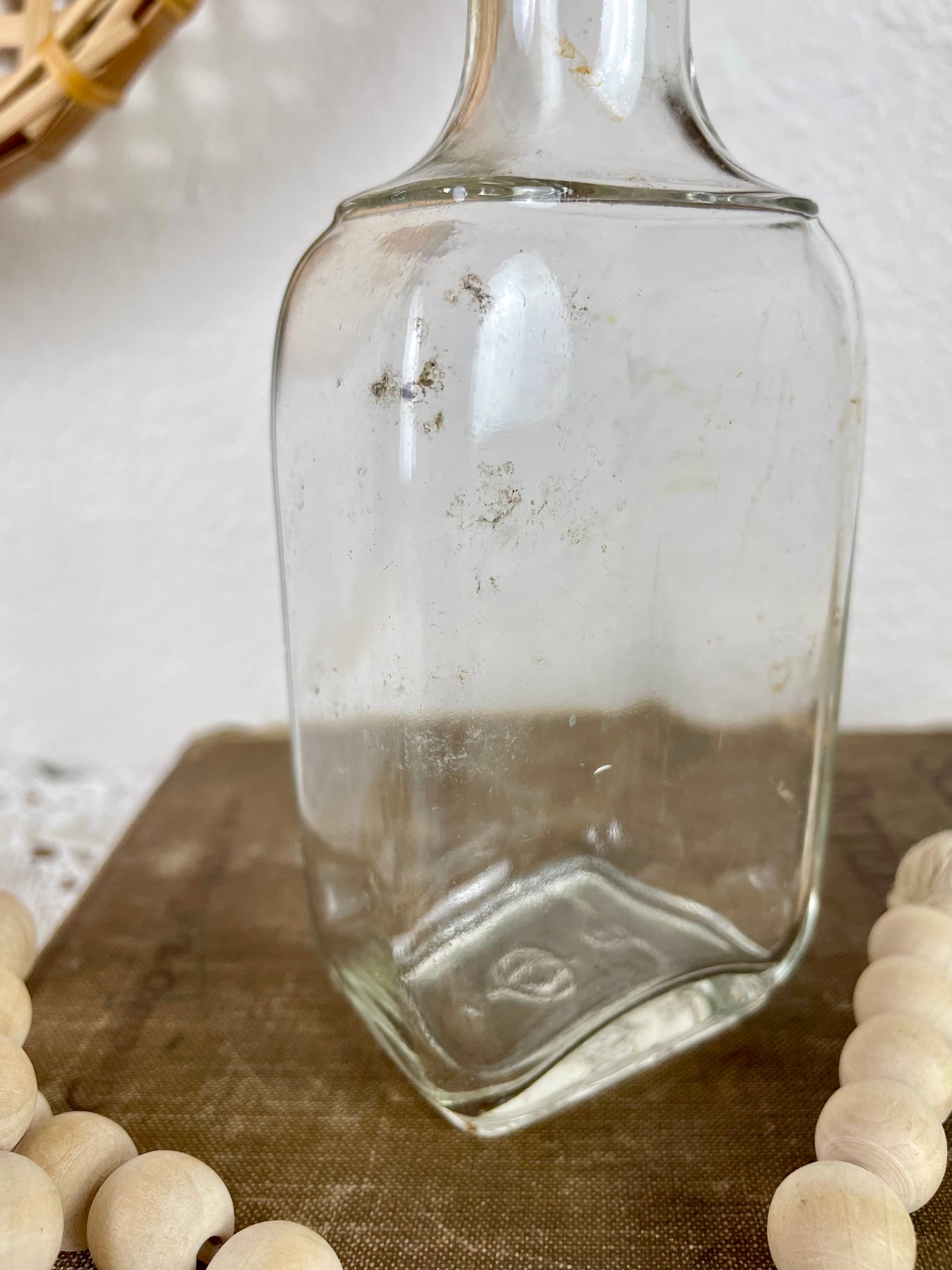 Vintage Clear Glass Bottle with Greenery