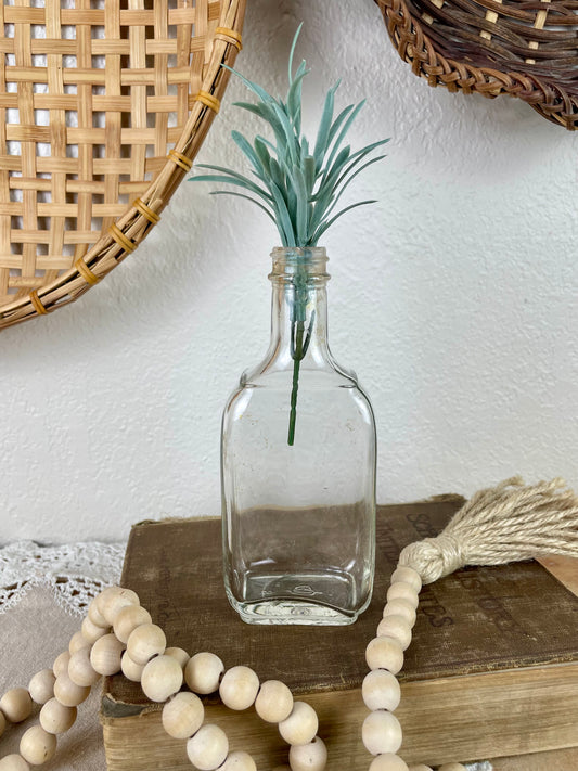 Vintage Clear Glass Bottle with Greenery