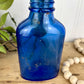 Vintage Cobalt Blue Glass Medicine Bottle with Greenery