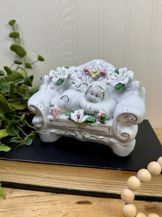 Vintage Porcelain Victorian Child on Floral Sofa Figurine