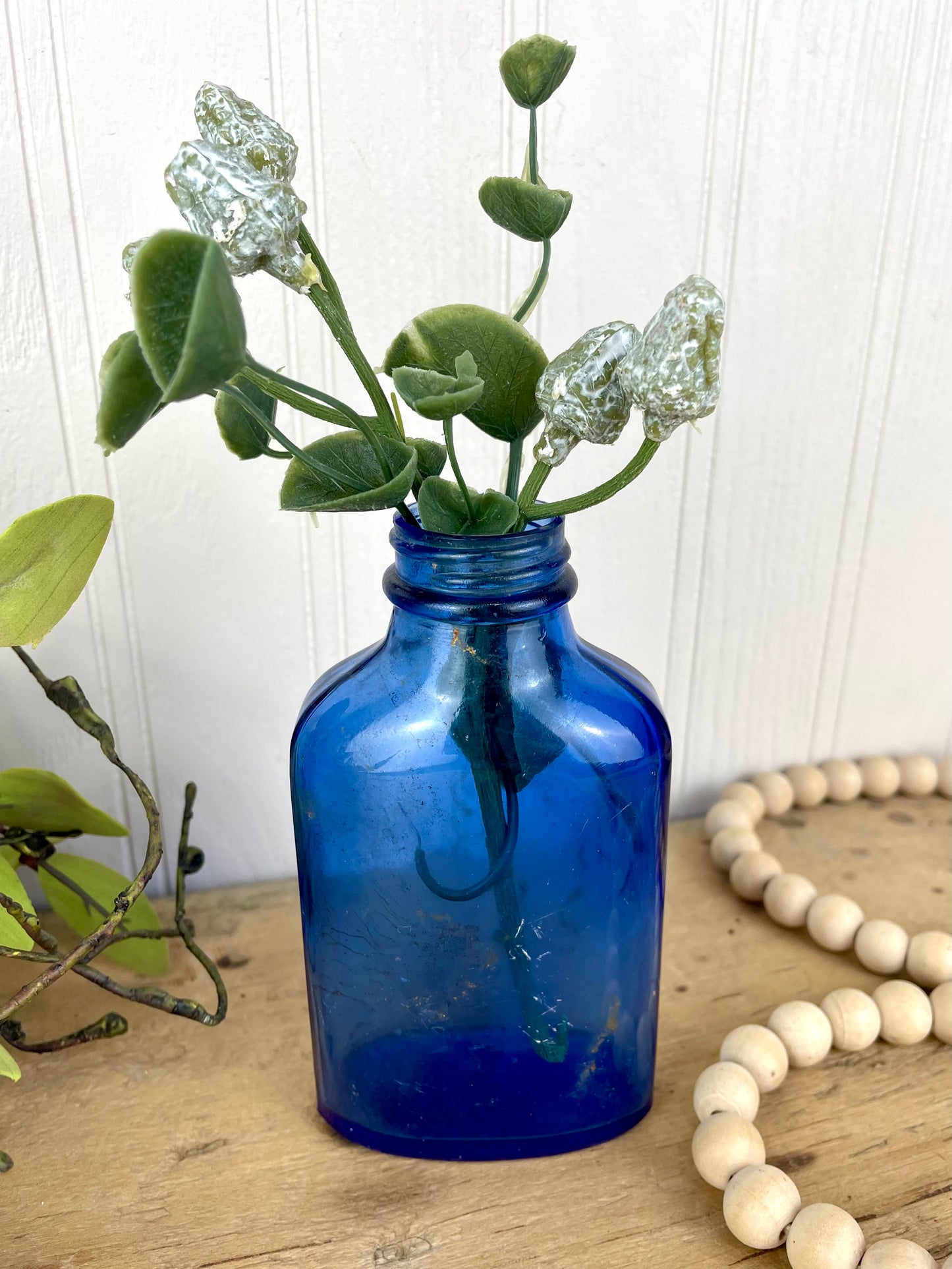 Vintage Cobalt Blue Glass Medicine Bottle with Greenery