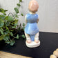 Vintage Porcelain Girl with Egg Basket Figurine