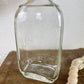 Vintage Clear Glass Bottle with Greenery