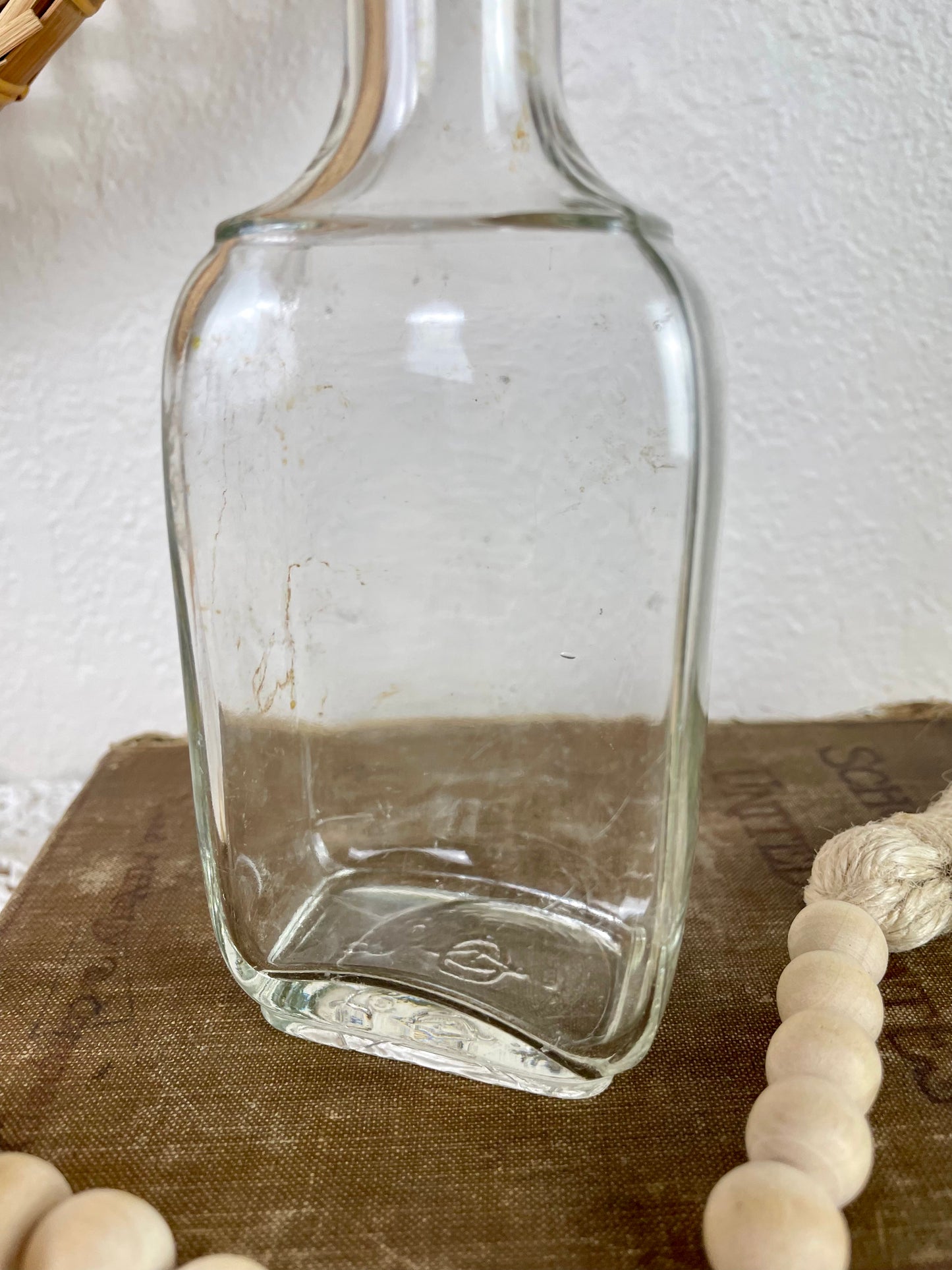 Vintage Clear Glass Bottle with Greenery