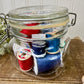 Vintage Glass Clasp Jar with Thread Spools