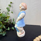 Vintage Porcelain Girl with Egg Basket Figurine