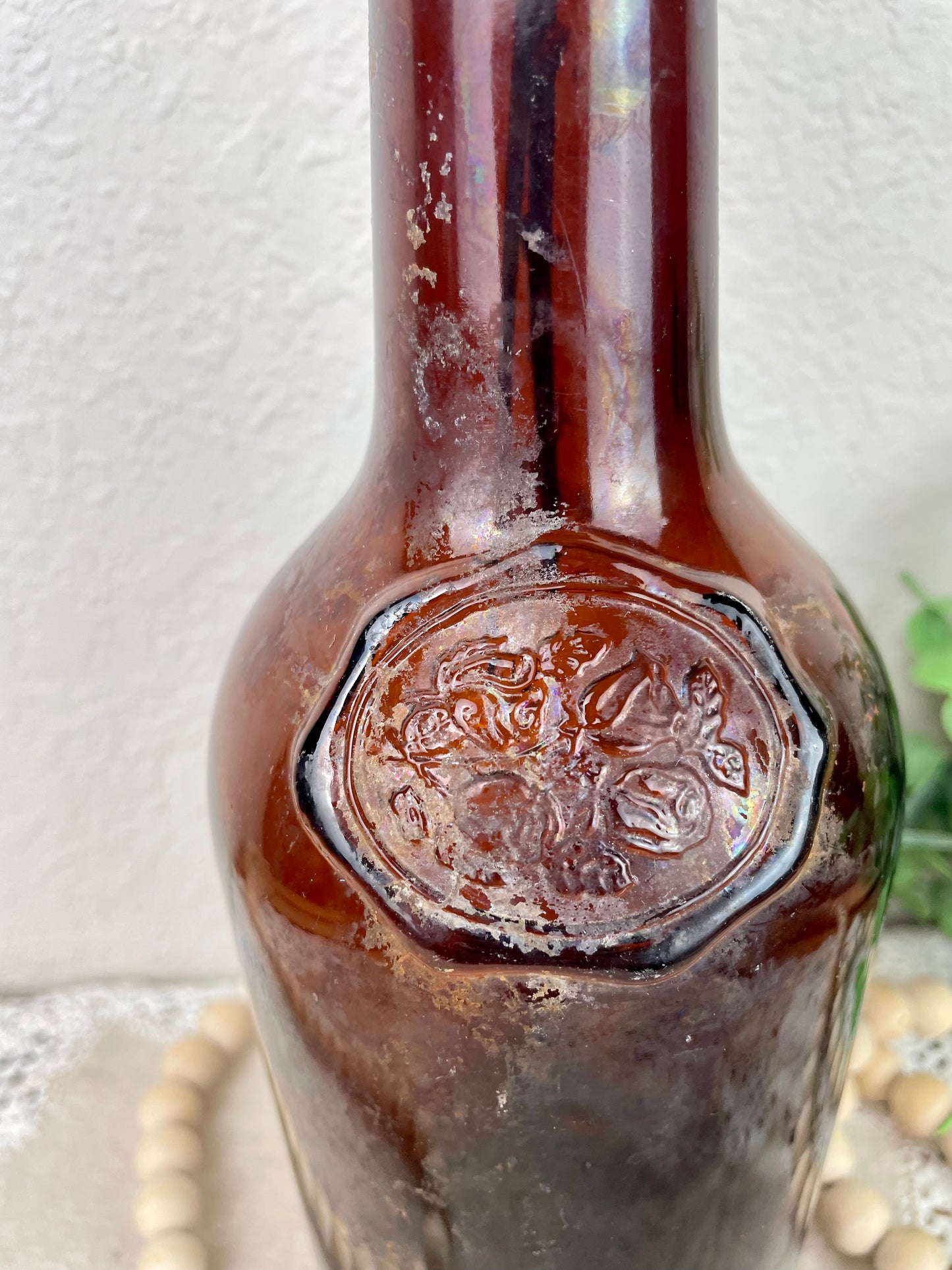 Vintage Amber Bottle with Rose Details with Greenery