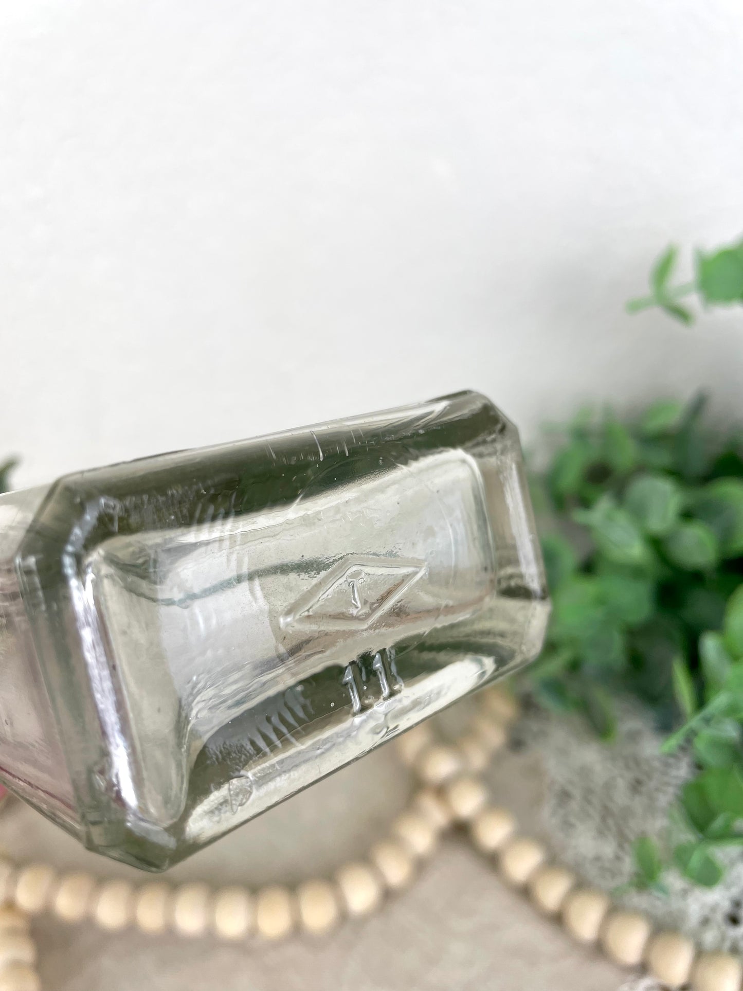 Vintage Glass Bottle with Greenery