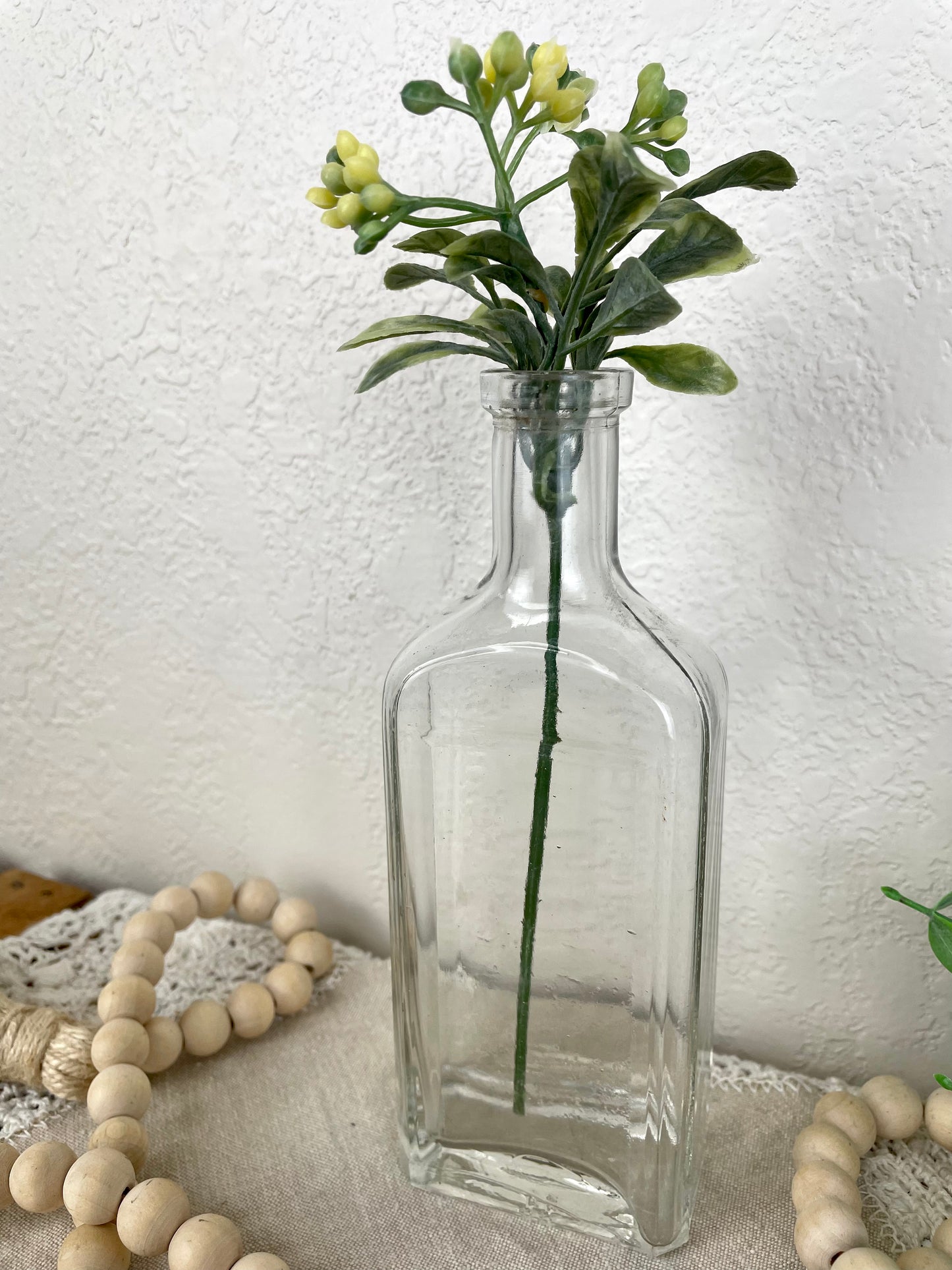 Vintage Glass Bottle with Greenery