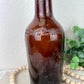 Vintage Amber Bottle with Rose Details with Greenery