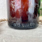 Vintage Amber Bottle with Rose Details with Greenery