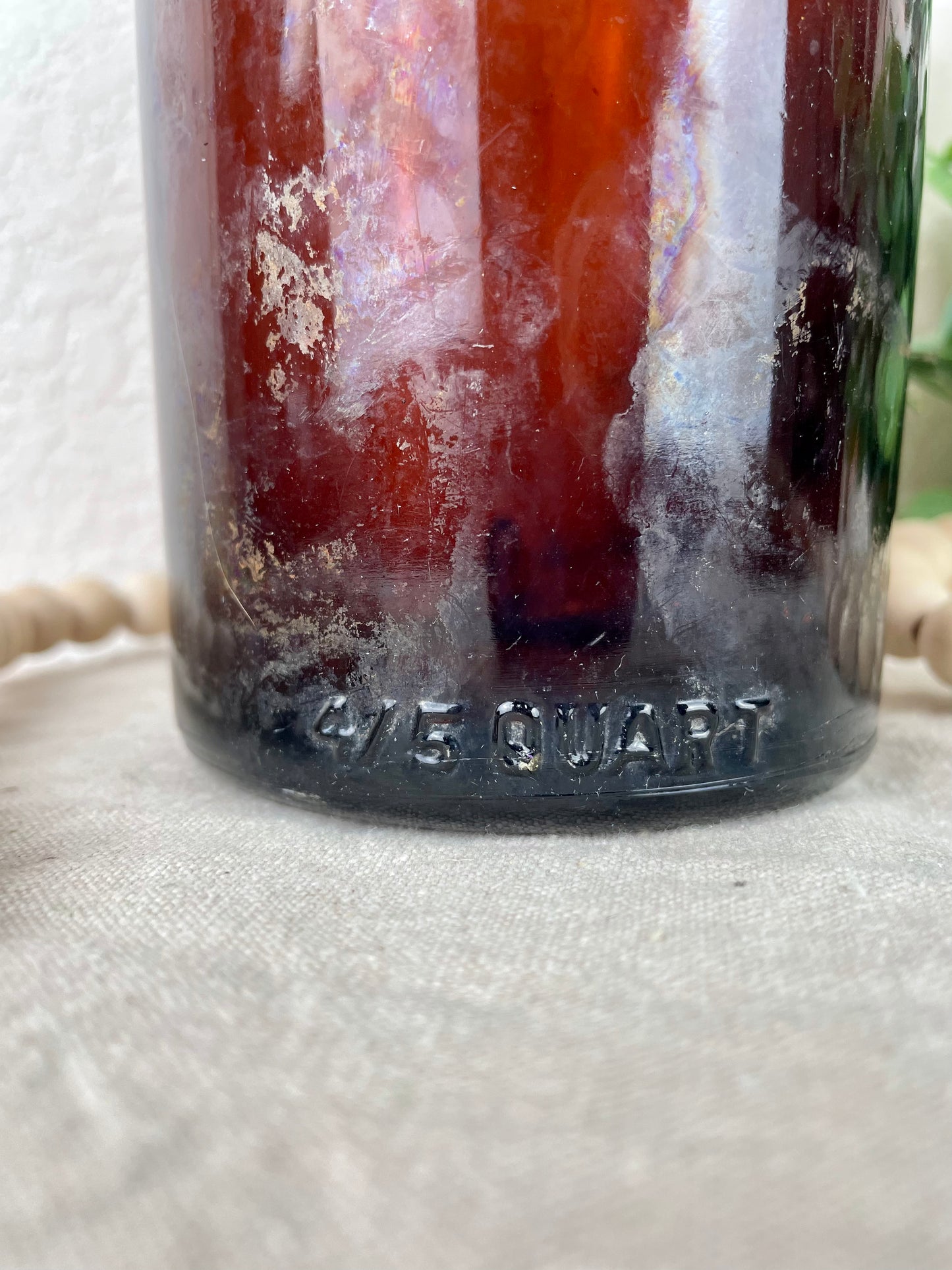 Vintage Amber Bottle with Rose Details with Greenery