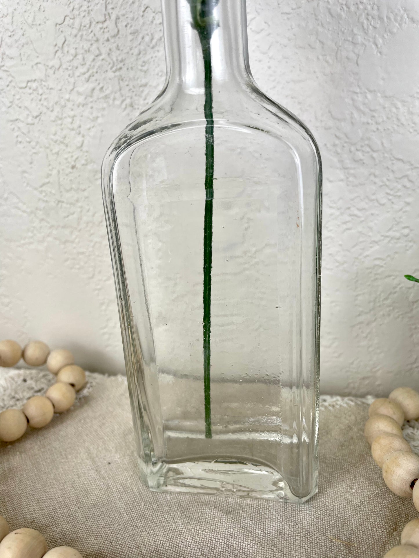 Vintage Glass Bottle with Greenery