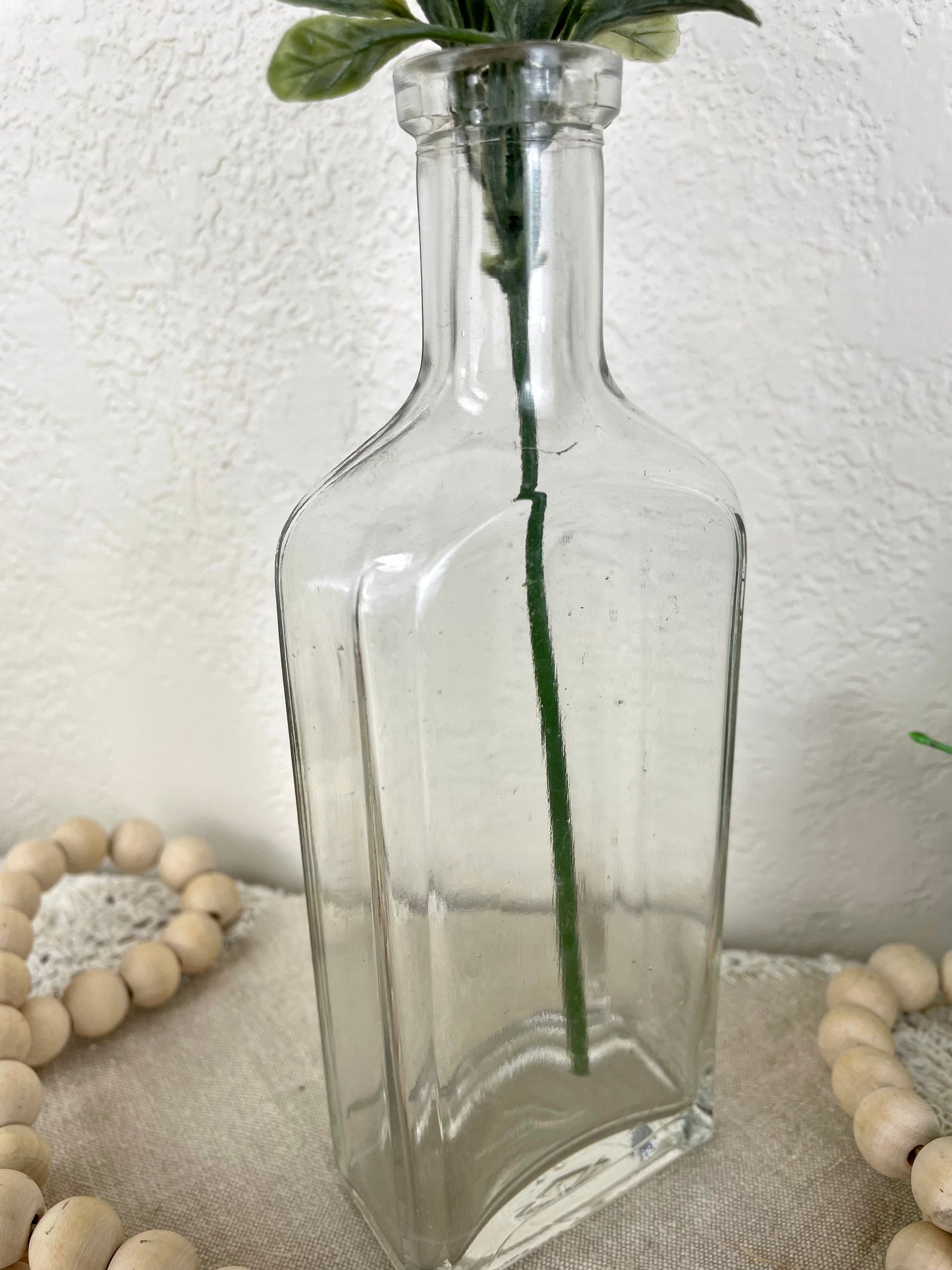 Vintage Glass Bottle with Greenery