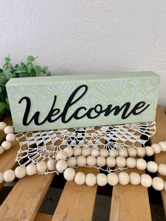 Handmade “Welcome” Shelf Sign